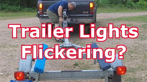 trailer junction box cause vehicle lights to flicker|towing trailer light fix.